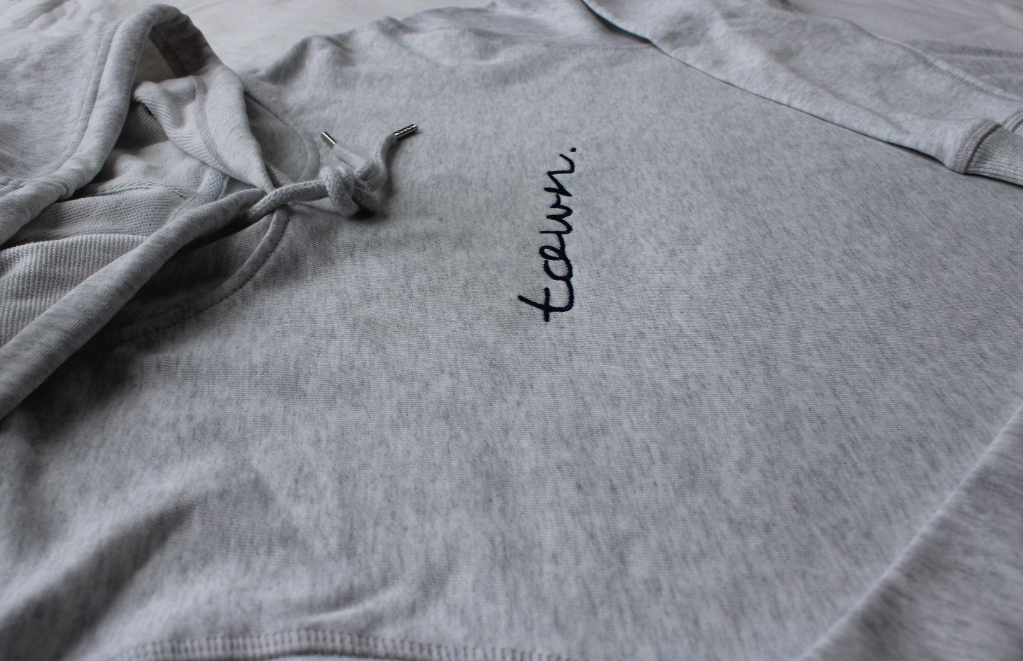 Premium Female Faded White Embroidered town. Hoodie