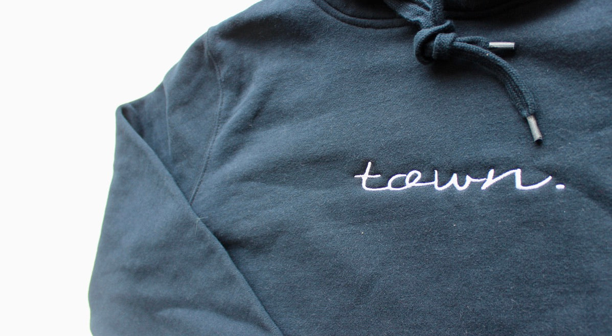 Premium Female Navy Embroidered town. Hoodie